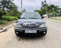 Ford Laser 2004 - Bán ô tô Ford Laser sản xuất 2004, màu đen, 157 triệu