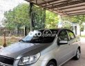 Chevrolet Aveo 2014 - Cần bán Chevrolet Aveo LT sản xuất 2014, màu bạc