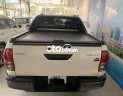 Toyota Hilux 2021 - Bán Toyota Hilux 2.4E năm 2021, màu trắng, nhập khẩu nguyên chiếc còn mới