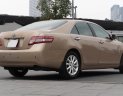 Toyota Camry 2009 - Bán xe Toyota Camry LE 2.5 năm sản xuất 2009, màu vàng, xe nhập