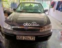 Ford Laser 2002 - Cần bán xe Ford Laser sản xuất 2002, màu đen xe gia đình, giá 110tr