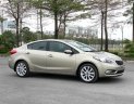 Kia K3 2014 - Bán Kia K3 1.6AT sản xuất năm 2014, màu vàng cát số tự động, 465 triệu