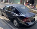 Ford Mondeo 2004 - Bán xe Ford Mondeo sản xuất 2004, màu đen số tự động