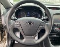 Kia K3 2014 - Cần bán gấp Kia K3 1.6AT sản xuất năm 2014, màu vàng cát, giá cạnh tranh