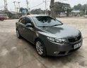 Kia Cerato 2009 - Bán Kia Cerato 1.6 số tự động sản xuất 2009, màu xám