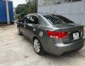 Kia Cerato 2009 - Bán Kia Cerato 1.6 số tự động sản xuất 2009, màu xám