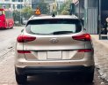 Hyundai Tucson 2020 - Bán Hyundai Tucson 2.0 ATH sản xuất năm 2020, màu vàng