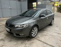 Kia Cerato 2009 - Bán Kia Cerato 1.6 số tự động sản xuất 2009, màu xám