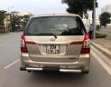 Toyota Innova 2014 - Cần bán lại xe Toyota Innova 2014, màu nâu số sàn, 365tr