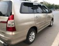 Toyota Innova 2014 - Cần bán lại xe Toyota Innova 2014, màu nâu số sàn, 365tr