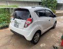 Chevrolet Spark 2015 - Cần bán xe Chevrolet Spark LTZ 1.0 AT sản xuất năm 2015, màu trắng số tự động