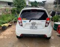 Chevrolet Spark 2015 - Cần bán xe Chevrolet Spark LTZ 1.0 AT sản xuất năm 2015, màu trắng số tự động