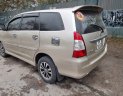 Toyota Innova 2012 - Cần bán lại xe Toyota Innova 2.0E sản xuất năm 2012, màu vàng 