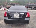 Daewoo Lacetti 2010 - Bán ô tô Daewoo Lacetti EX năm 2010, màu đen xe gia đình, 165 triệu