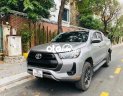 Toyota Hilux 2020 - Bán Toyota Hilux E năm sản xuất 2020, màu bạc còn mới  