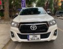 Toyota Hilux 2018 - Cần bán lại xe Toyota Hilux 2.4E năm 2018, màu trắng, xe nhập số tự động