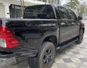 Toyota Hilux 2021 - Cần bán xe Toyota Hilux 2.5E MT 2021, màu đen, giá 735tr