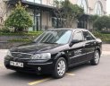 Ford Laser 2004 - Bán ô tô Ford Laser sản xuất năm 2004, màu đen, 179 triệu