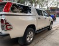 Toyota Hilux 2018 - Cần bán lại xe Toyota Hilux 2.4E năm 2018, màu trắng, xe nhập số tự động