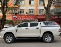 Toyota Hilux 2018 - Cần bán lại xe Toyota Hilux 2.4E năm 2018, màu trắng, xe nhập số tự động