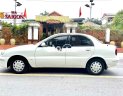 Daewoo Lanos 2003 - Cần bán Daewoo Lanos sản xuất năm 2003, màu trắng còn mới, giá tốt