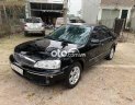 Ford Laser 2002 - Màu đen, giá 98tr