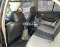 Ford Laser 2002 - Màu đen, giá 98tr