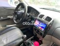 Ford Laser 2002 - Màu đen, giá 98tr