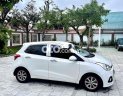 Hyundai Grand i10 2015 - Màu trắng xe gia đình giá ưu đãi