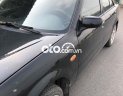 Mazda 323 2003 - Màu đen, giá chỉ 160 triệu