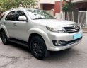 Toyota Fortuner AT 2015 - Tôi cần bán xe Fortuner 2015, số tự động, máy xăng, màu bạc còn mới tinh