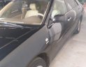 Toyota Camry 2003 - Màu đen số sàn