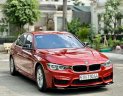 BMW 320i 2018 - Bán xe đỏ cam, nội thất đen kem