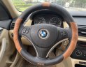 BMW X1 2011 - Màu trắng kem loại full đồ chơi nhà mua mới, một đời trùm mền ít đi xe vào rất nhiều đồ chơi