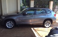 BMW X1 2.0 2009 - Cần bán BMW X1 2.0 đời 2009, màu xám, giá 800tr giá 800 triệu tại Đắk Lắk