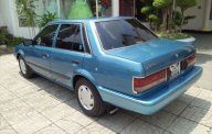 Mazda 323 1990 - Cần bán Mazda 323 đời 1990, màu xanh, nhập khẩu chính hãng giá 85 triệu tại Tp.HCM