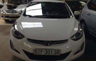 Hyundai Elantra AT 2014 - Cần bán xe Hyundai Elantra AT đời 2014, màu trắng số tự động giá 665 triệu tại Tp.HCM