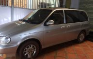 Kia Carnival 2000 - Cần bán Kia Carnival đời 2000, màu xám giá 175 triệu tại Đắk Lắk