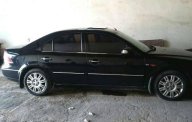 Ford Mondeo 2002 - Cần bán lại xe Ford Mondeo đời 2002, màu đen giá 210 triệu tại Nghệ An