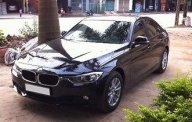 BMW 3 Series 320i 2012 - Bán BMW 3 Series 320i đời 2012, màu đen giá 110 triệu tại Bình Thuận  