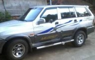 Ssangyong Musso 2001 - Cần bán gấp Ssangyong Musso đời 2001, màu bạc xe gia đình giá 142 triệu tại Bình Phước