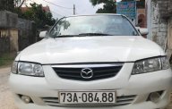 Mazda 626 2002 - Cần bán gấp Mazda 626 2002, màu trắng giá 169 triệu tại Quảng Bình