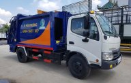 Xe tải 1250kg 2018 - Bán trả góp xe ép rác Hino 6 khối giá 940 triệu tại Bình Dương