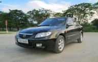 Mazda 323 GLX 2003 - Chính chủ bán Mazda 323 GLX năm 2003, màu đen giá 145 triệu tại Thanh Hóa