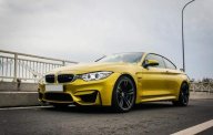 BMW M4 2016 - Cần bán lại xe BMW M4 sản xuất 2016, màu vàng, xe nhập giá 3 tỷ 350 tr tại Tp.HCM