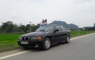 BMW 3 Series 320i 1997 - Bán xe BMW 3 Series 320i năm 1997, màu đen, xe nhập  giá 60 triệu tại Thanh Hóa