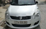 Suzuki Swift 2014 - Cần bán gấp Suzuki Swift sản xuất năm 2014, màu bạc chính chủ giá 445 triệu tại Thái Bình