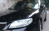 Mazda 323 2004 - Gia đình bán Mazda 323 2004, màu đen, 150tr giá 150 triệu tại Kon Tum