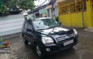 Kia Sportage MT 2008 - Mình cần bán Kia Sportage màu đen MT 2008, hai cầu máy dầu, xe rất đẹp giá 400 triệu tại Tp.HCM