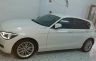 BMW 1 Series   1.6 AT  2013 - Cần bán BMW 1 Series 1.6 AT sản xuất 2013, màu trắng  giá 875 triệu tại Tp.HCM